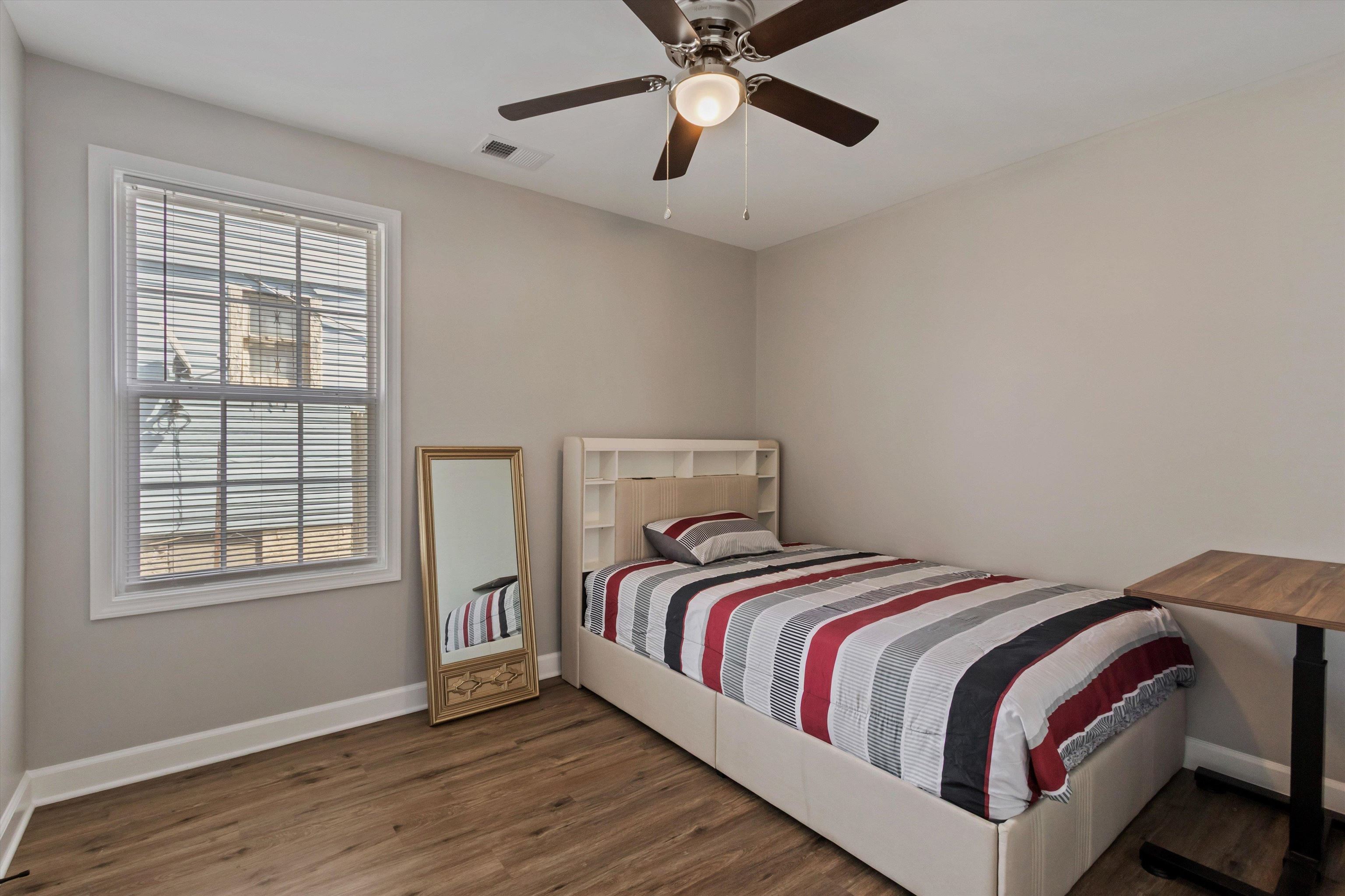 1217 Carlton Road Memphis, TN 38106 - Photo 20 of 32 Bedroom featuring dark wood-style flooring and a ceiling fan