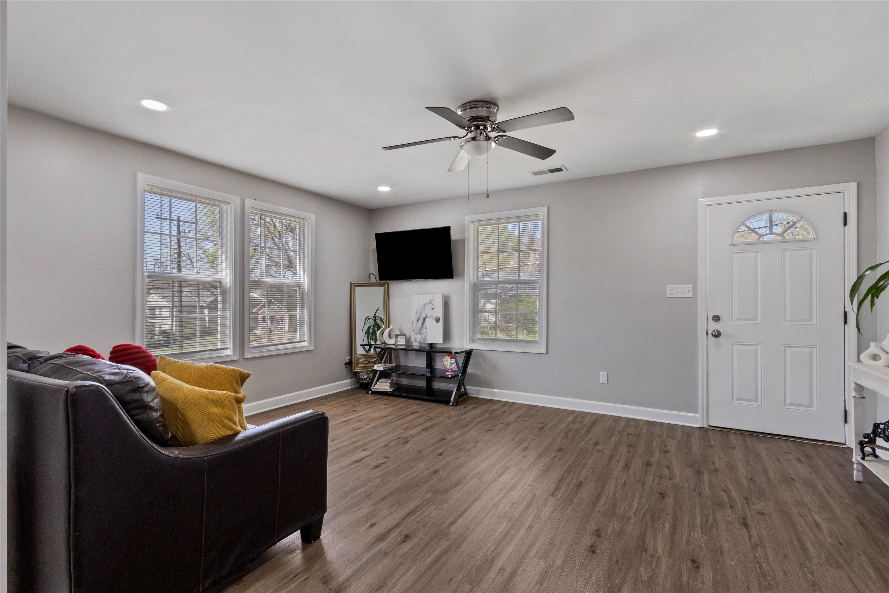 1217 Carlton Road Memphis, TN 38106 - Photo 5 of 32 Living area with dark wood-style flooring, a ceiling fan, and recessed lighting
