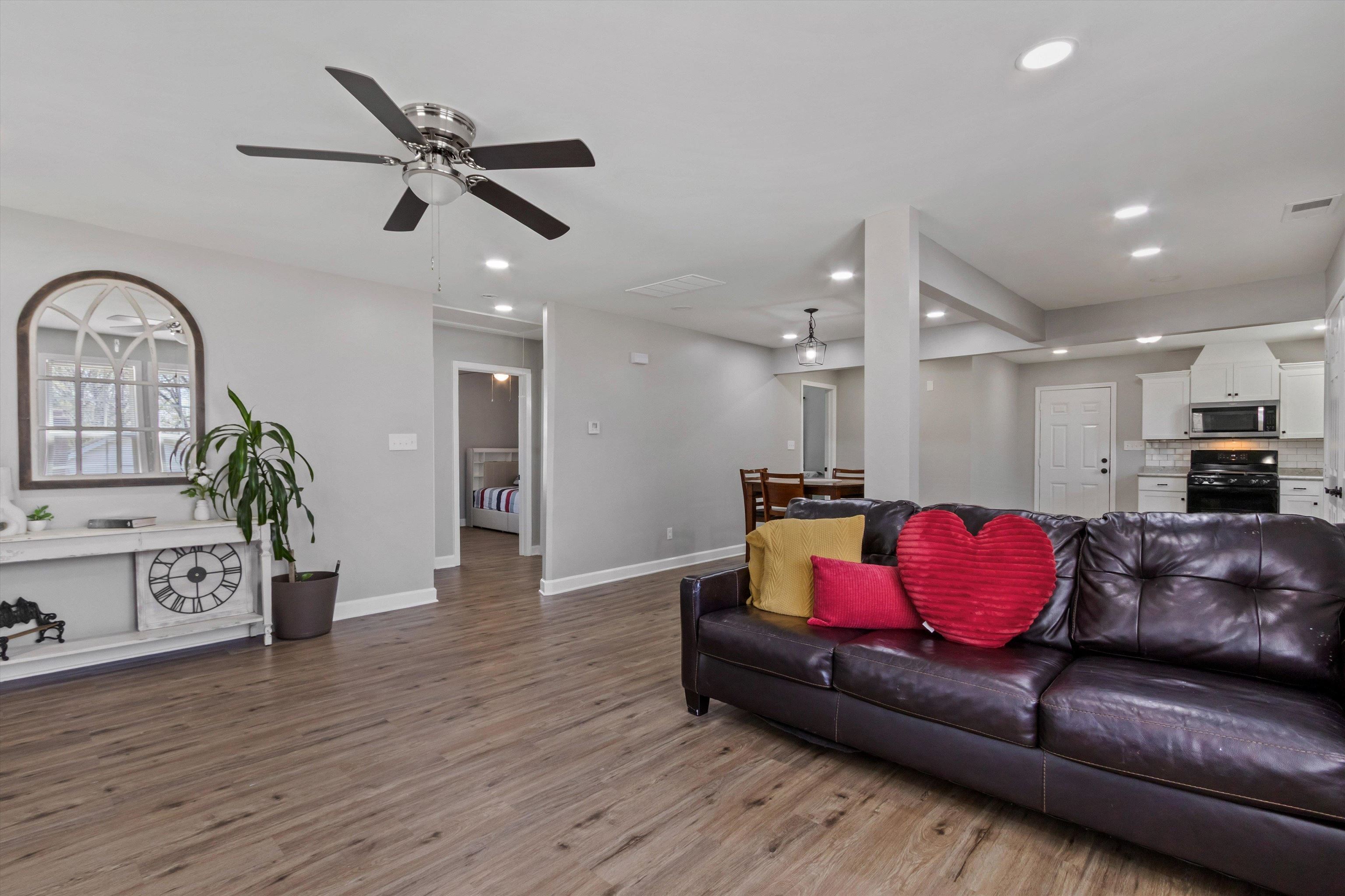 1217 Carlton Road Memphis, TN 38106 - Photo 6 of 32 Living room with ceiling fan, light wood-style flooring, and recessed lighting