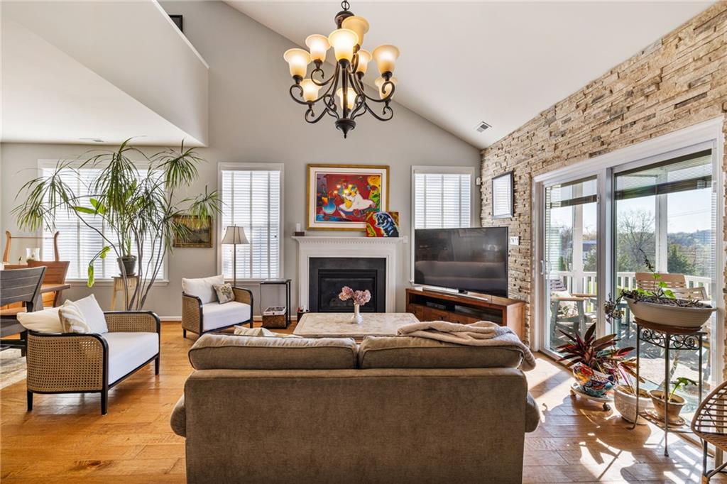 140 Independence Way Sewickley, PA 15143 - Photo 14 of 33 a living room with fireplace furniture and a flat screen tv