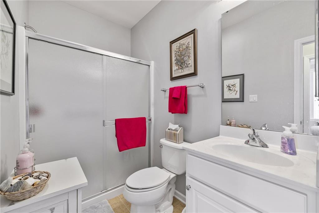 140 Independence Way Sewickley, PA 15143 - Photo 20 of 33 a bathroom with a sink toilet and a mirror