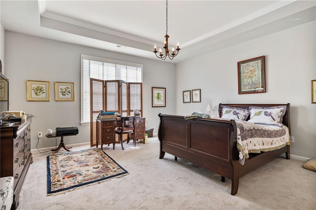 140 Independence Way Sewickley, PA 15143 - Photo 21 of 33 a living room with furniture and a chandelier