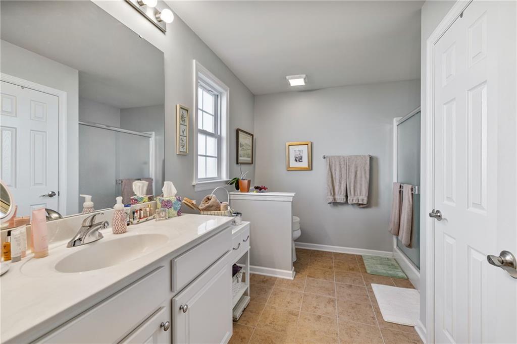 140 Independence Way Sewickley, PA 15143 - Photo 23 of 33 a bathroom with a sink double vanity and a mirror