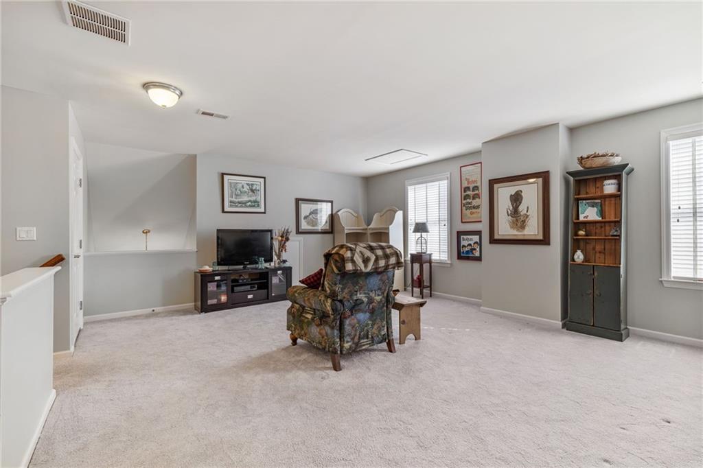 140 Independence Way Sewickley, PA 15143 - Photo 24 of 33 a living room with furniture and large windows