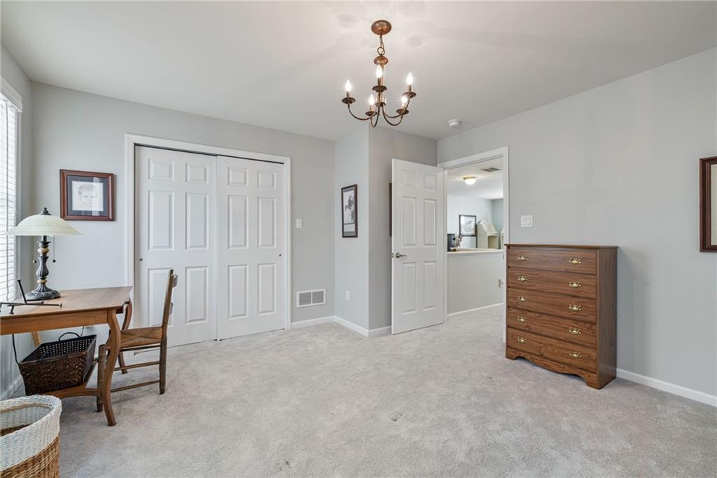140 Independence Way Sewickley, PA 15143 - Photo 28 of 33 a view of a livingroom with a cabinet and a chandelier