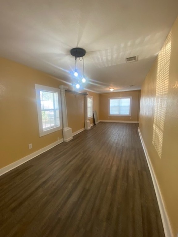 214 South Hackberry Avenue Luling, TX 78648 - Photo 11 of 22 a view of an empty room and a window