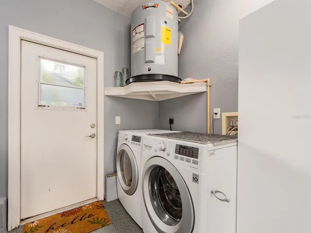 a view of washer and dryer in a utility room