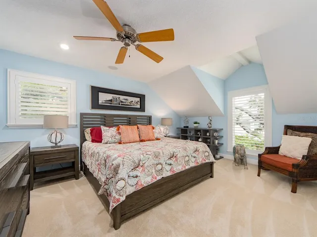 a bedroom with a bed and furniture