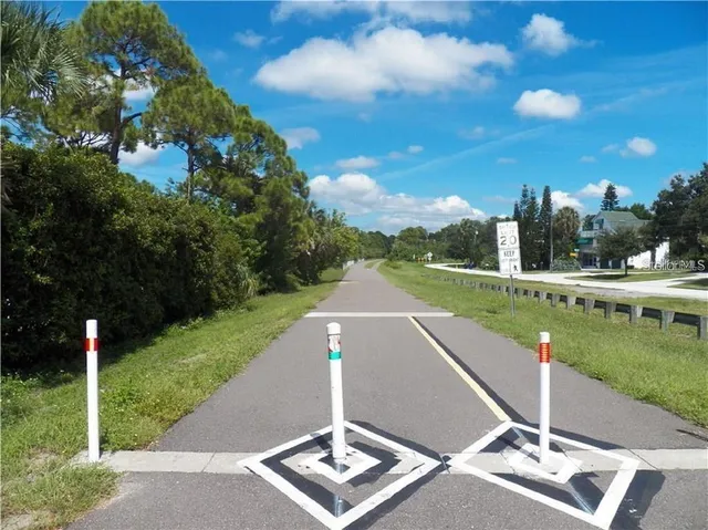 a view of a golf course with a lake