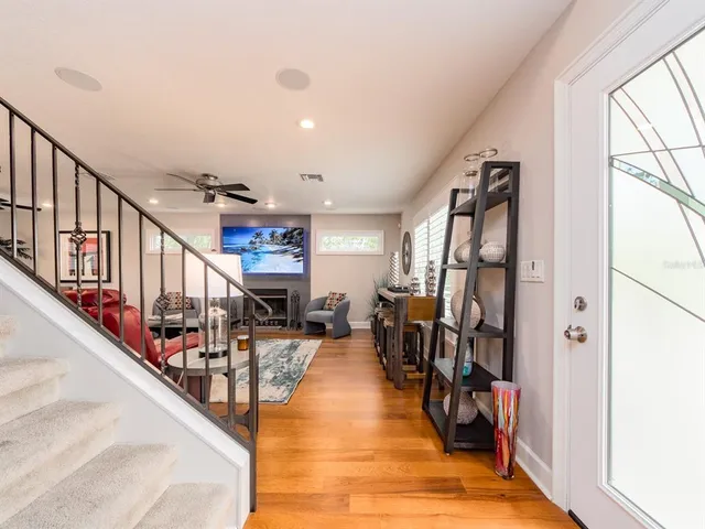 a hallway with lots of wooden furniture