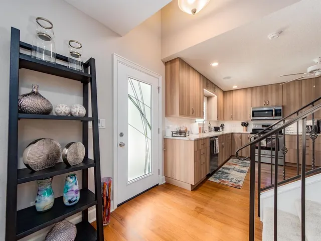 a view of kitchen with furniture and a window