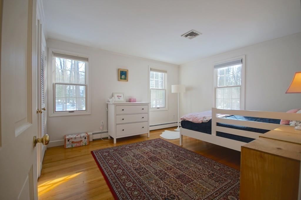 19 Towne Road Boxford, MA 01921 - Photo 19 of 39 a living room with furniture and a rug