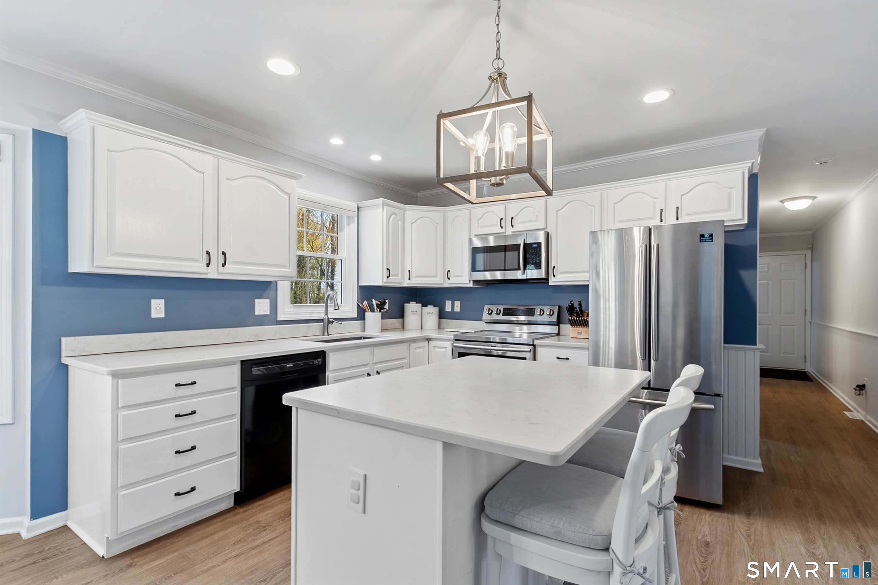 45 Beardsley Road New Milford, CT 06776 - Photo 12 of 40 The updated Eat-In Kitchen features Quartz counters and stainless steel appliances
