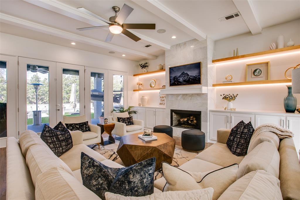 7141 Northaven Road Dallas, TX 75230 - Photo 8 of 38 Living room with built-ins and fireplace