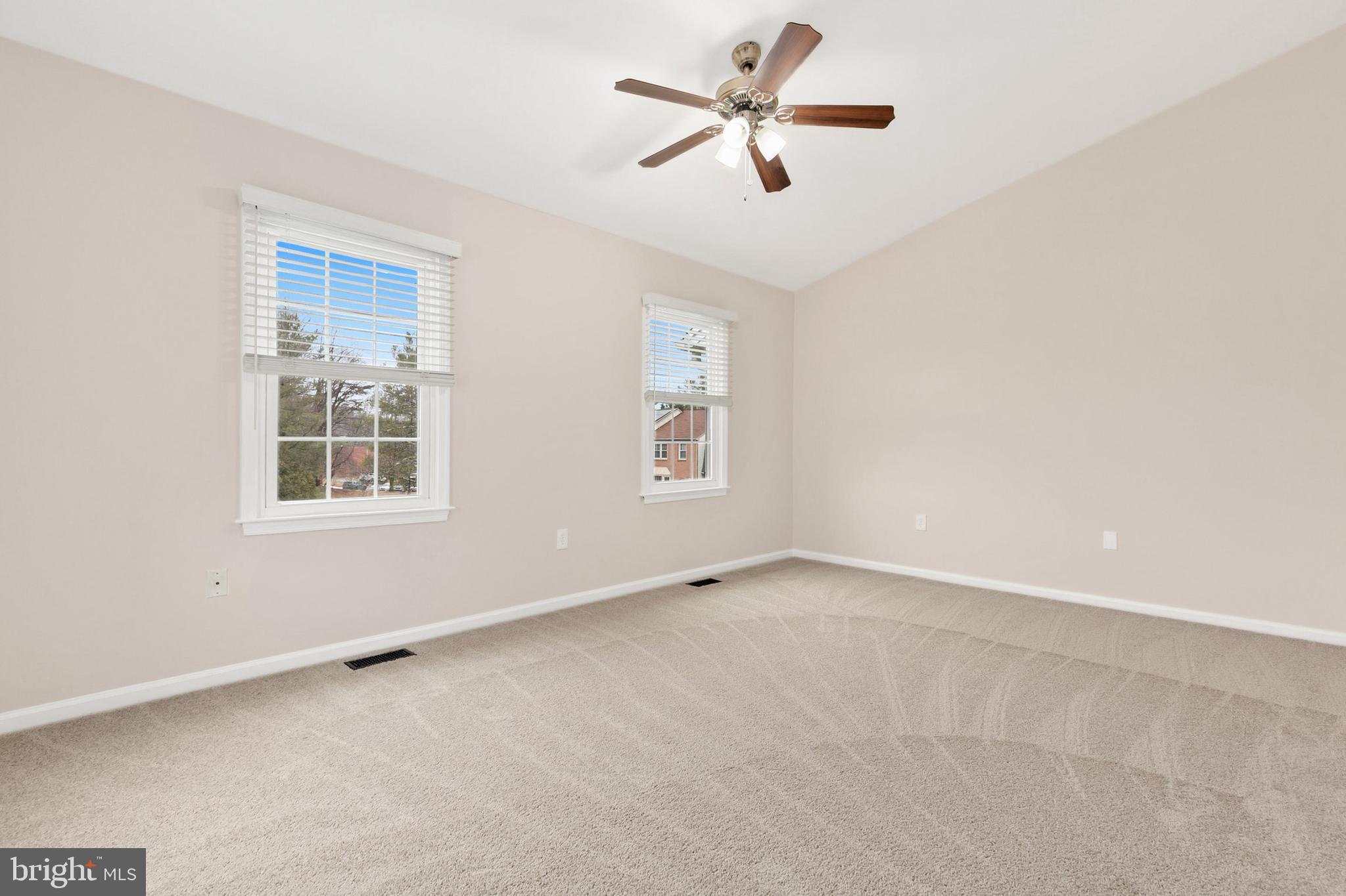 3133 Beaverwood Lane Silver Spring, MD 20906 - Photo 19 of 41 an empty room with windows and fan