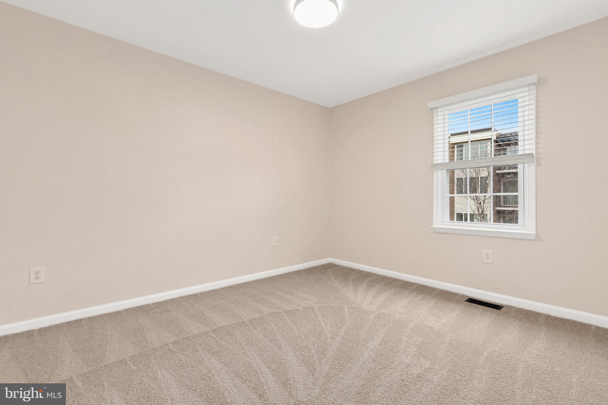 3133 Beaverwood Lane Silver Spring, MD 20906 - Photo 25 of 41 an empty room with windows