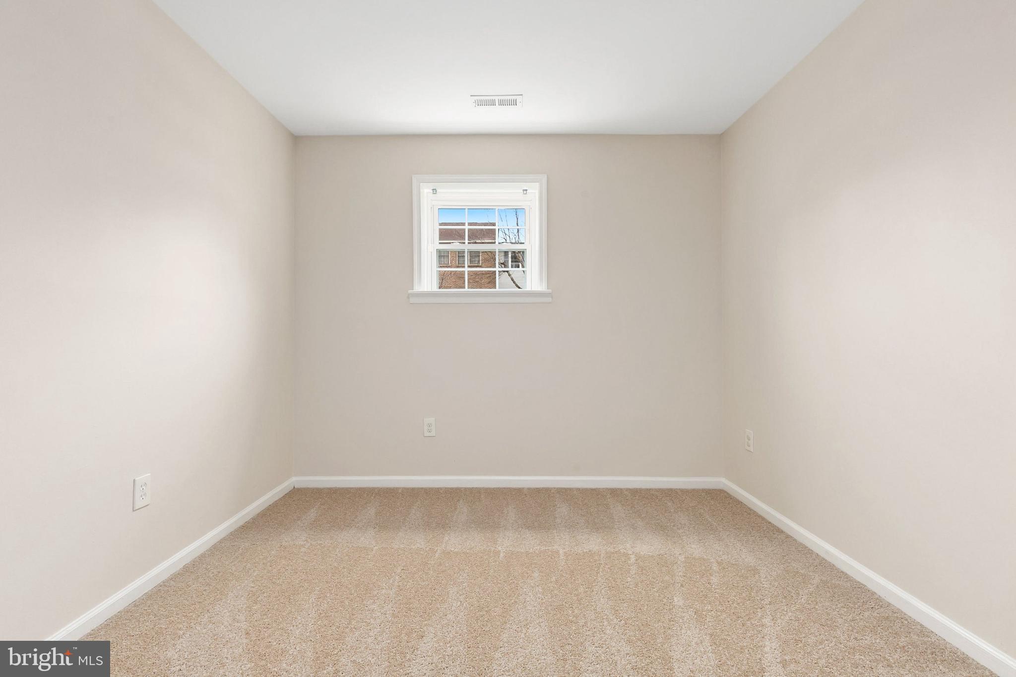 3133 Beaverwood Lane Silver Spring, MD 20906 - Photo 35 of 41 a view of a small space with wooden floor and a window