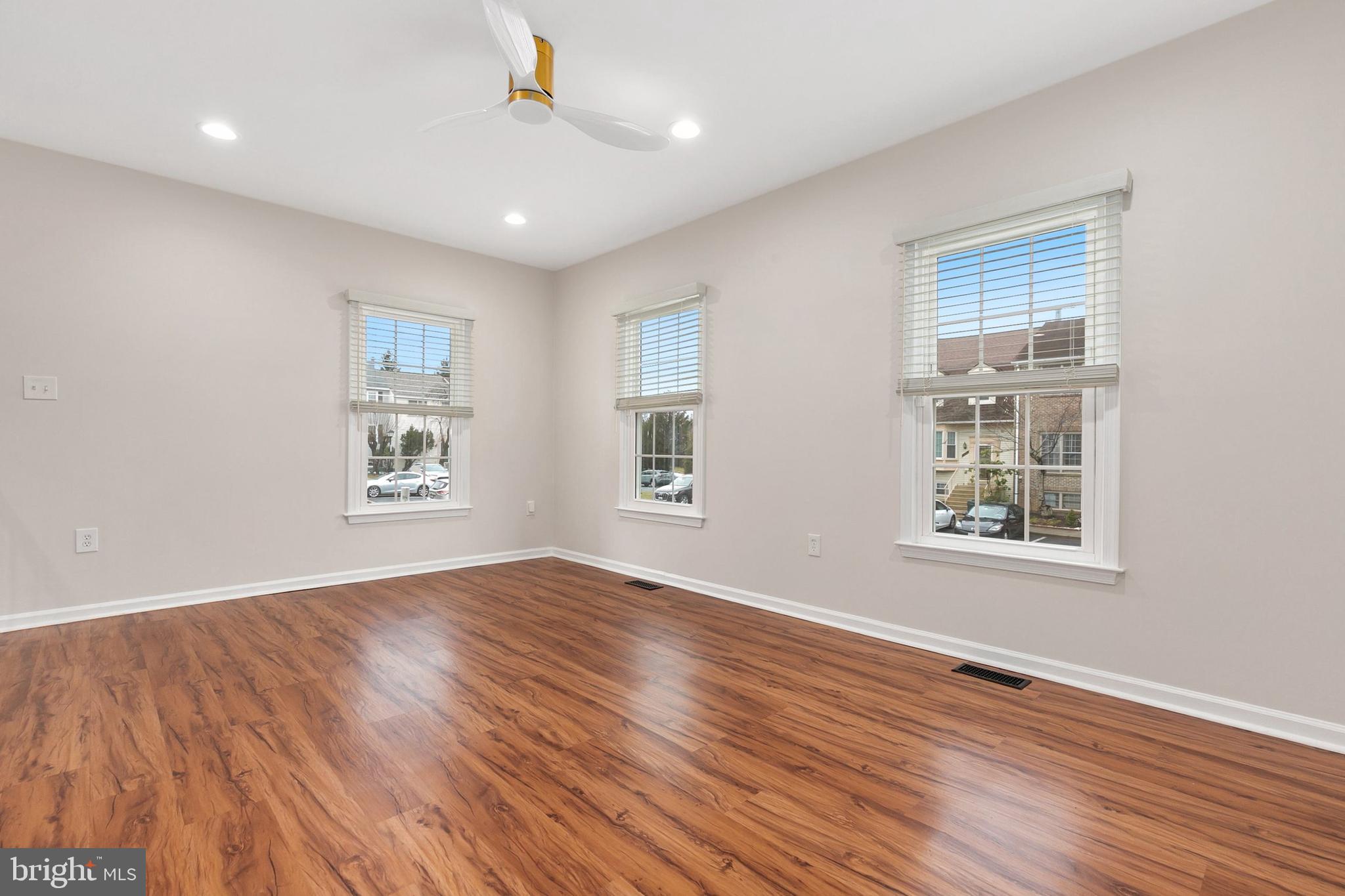 3133 Beaverwood Lane Silver Spring, MD 20906 - Photo 6 of 41 a view of an empty room with wooden floor and a window