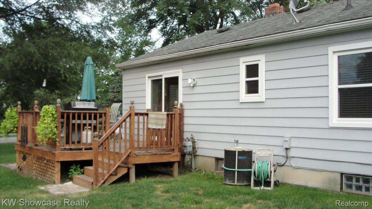 7599 Highland Road White Lake, MI 48383 - Photo 17 of 20 Rear Elevation w/Deck
