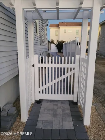 a view of a porch with wooden floor