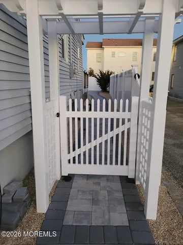 a view of a porch with wooden floor