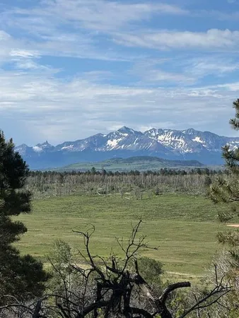 a view of a lake with a mountain in the background