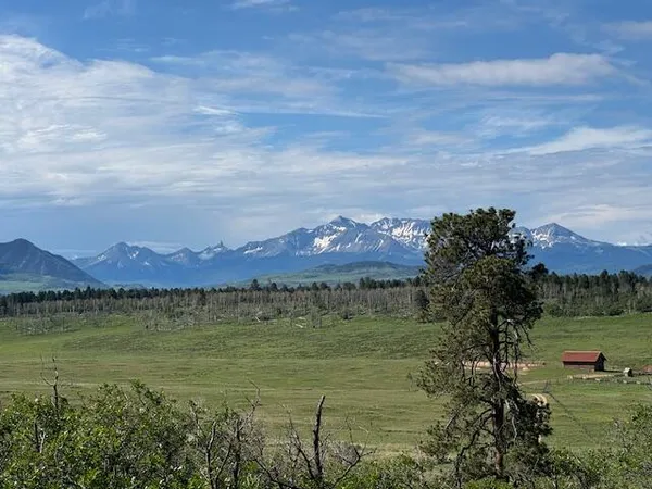 a view of a lake with a mountain