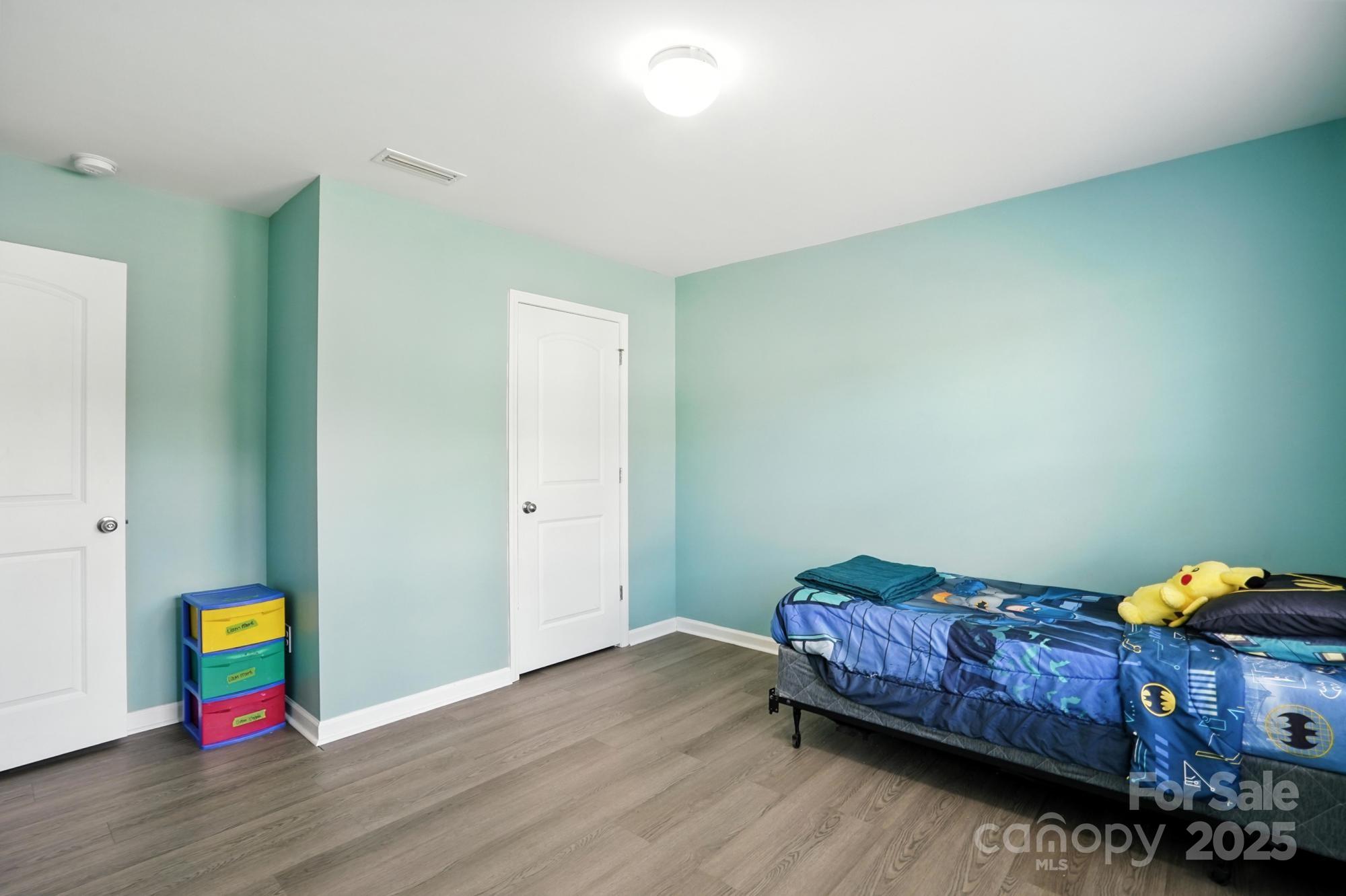 6405 Fawn Crest Drive Waxhaw, NC 28173 - Photo 24 of 38 a bedroom with bed and a window