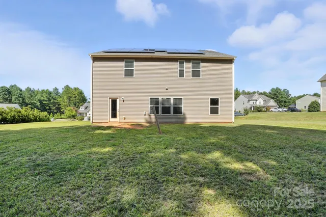 a view of a table and chairs in patio