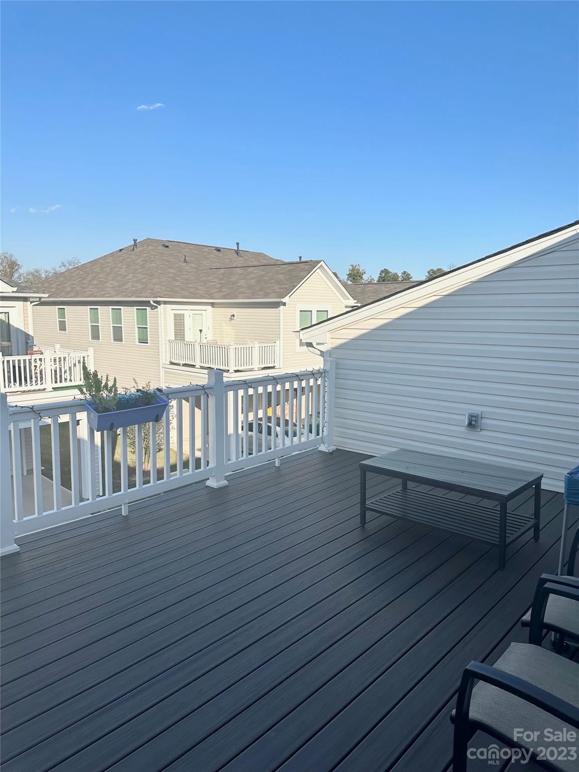 1424 Galloway Road Charlotte, NC 28262 - Photo 18 of 18 a view of a terrace with wooden benches