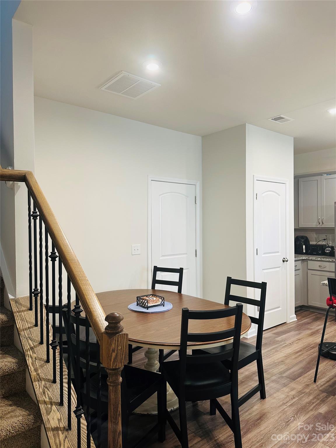 1424 Galloway Road Charlotte, NC 28262 - Photo 5 of 18 a view of a dining room with furniture and wooden floor