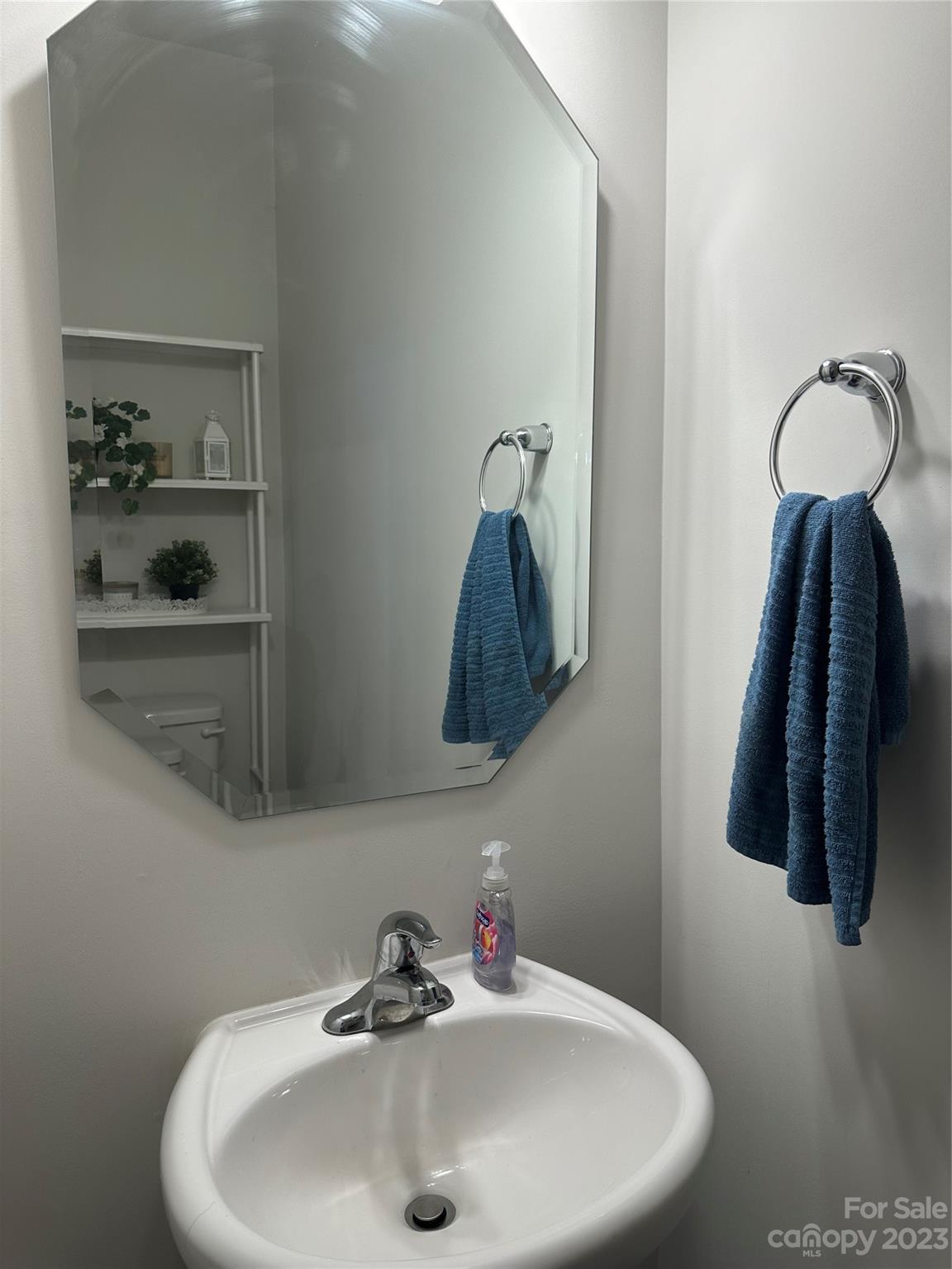 1424 Galloway Road Charlotte, NC 28262 - Photo 6 of 18 a bathroom with a sink and a mirror