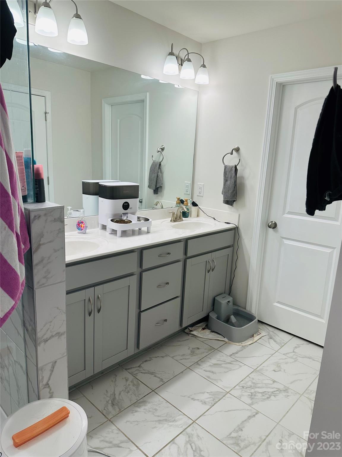1424 Galloway Road Charlotte, NC 28262 - Photo 9 of 18 a spacious bathroom with a double vanity sink mirror and toilet