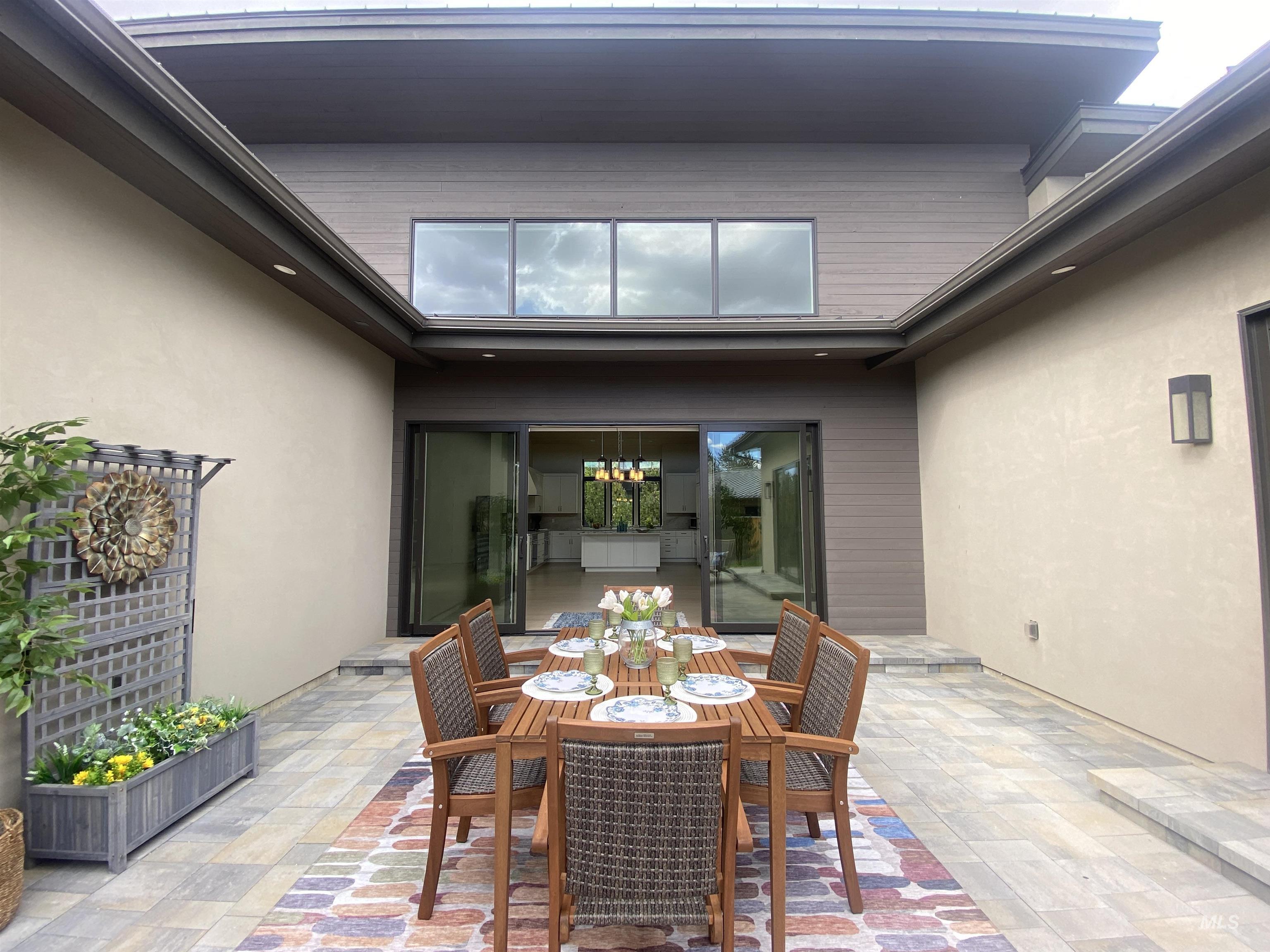 27 Streamside Drive Hailey, ID 83333 - Photo 12 of 39 Expansive outdoor patio with multi-toned paver flooring