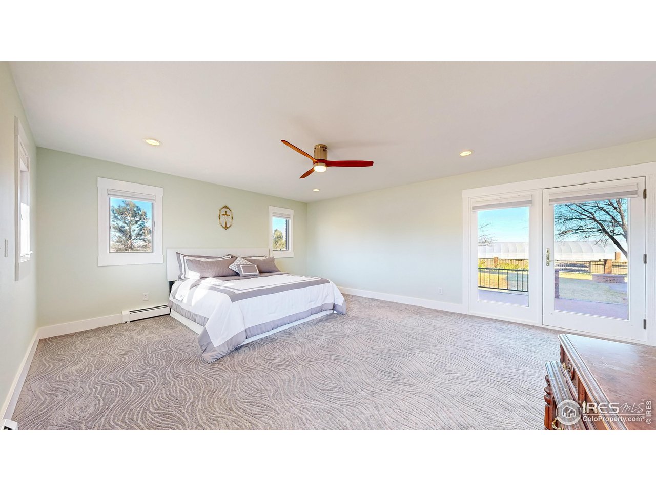 5708 South Timberline Road Fort Collins, CO 80528 - Photo 15 of 49 Dual primary suites: Primary suite on the North end of the home boasts direct access to the outdoor patio and living spaces