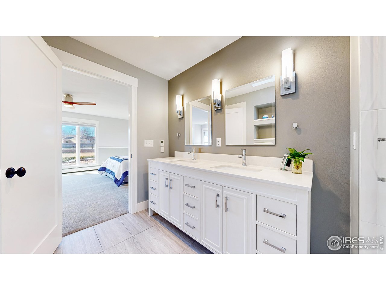 5708 South Timberline Road Fort Collins, CO 80528 - Photo 21 of 49 Private en-suite bathroom on second primary includes a double sink and spacious shower space