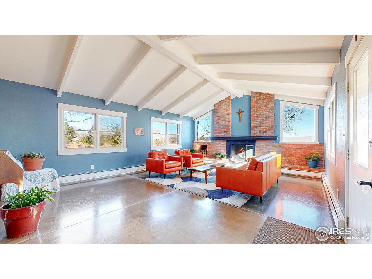 5708 South Timberline Road Fort Collins, CO 80528 - Photo 23 of 49 Family room is an inviting space offering an open space for gatherings and relaxation