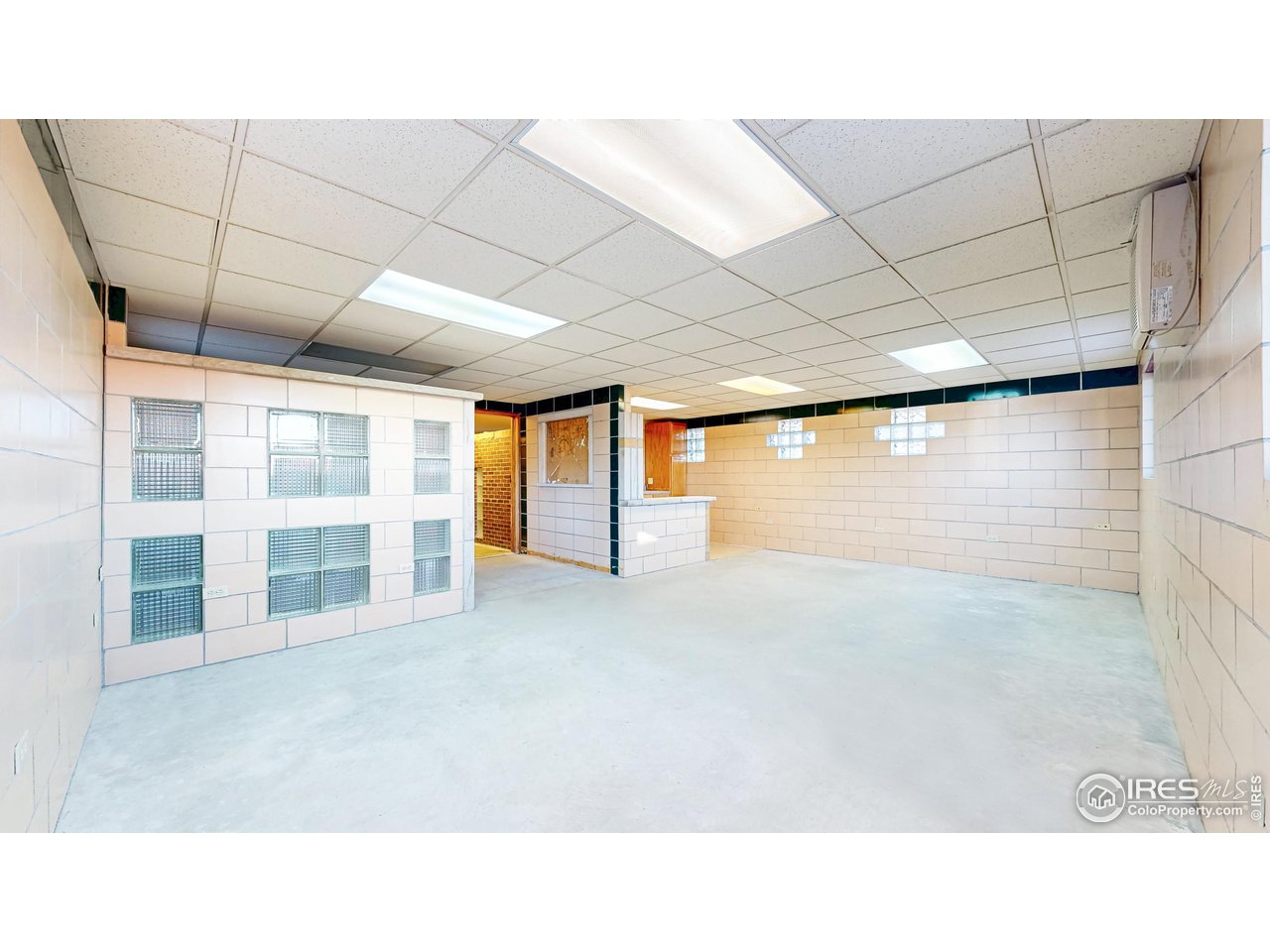5708 South Timberline Road Fort Collins, CO 80528 - Photo 41 of 49 Outbuilding contains three rooms with utility wash rooms