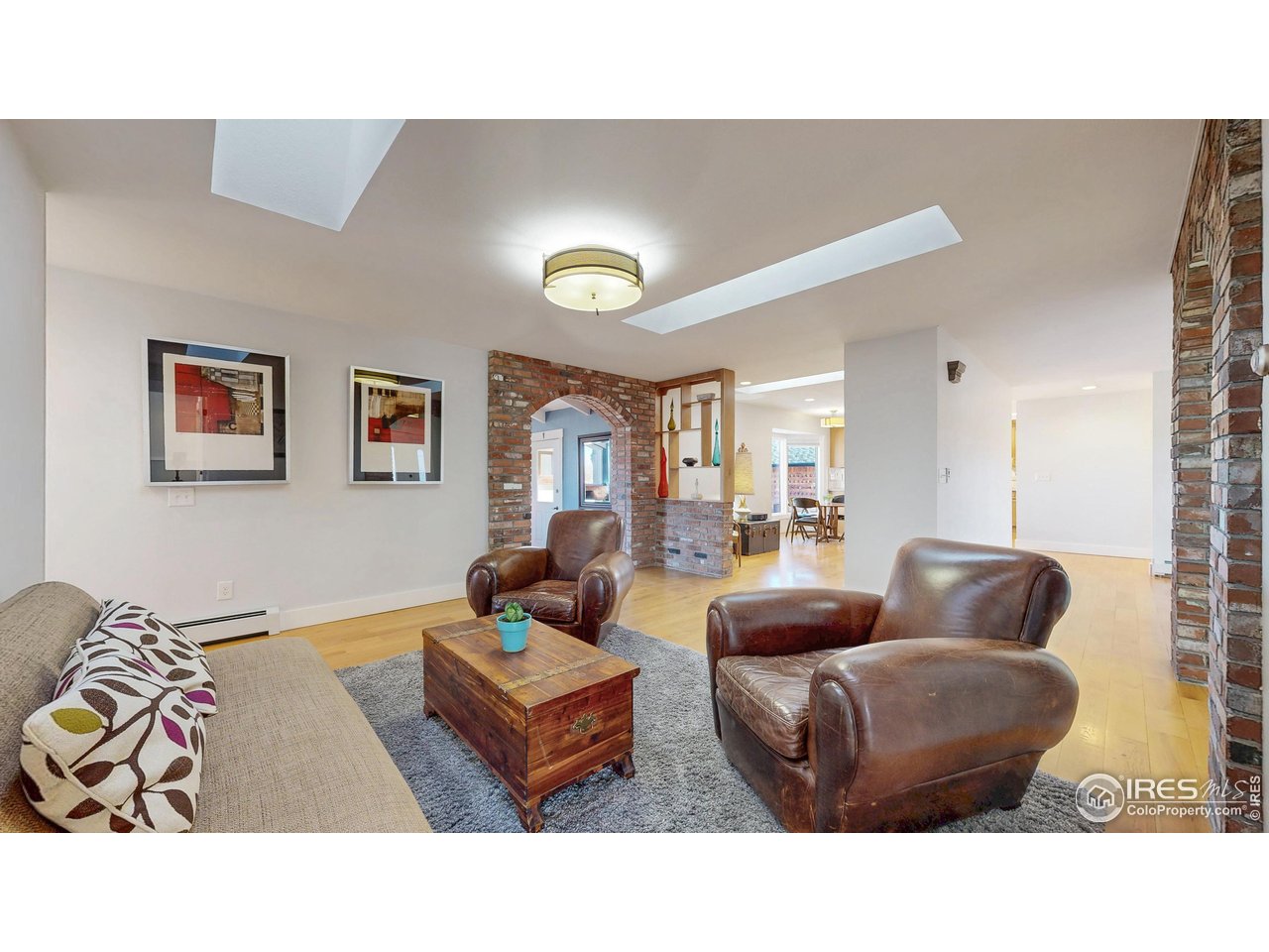 5708 South Timberline Road Fort Collins, CO 80528 - Photo 6 of 49 High quality wood flooring and brick/masonry accents