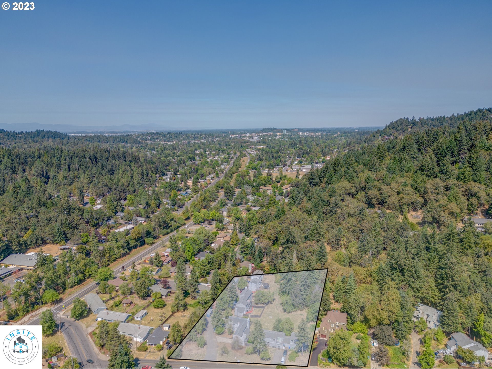 1357 East 43rd Avenue Eugene, OR 97405 - Photo 24 of 28 an aerial view of a house with a yard