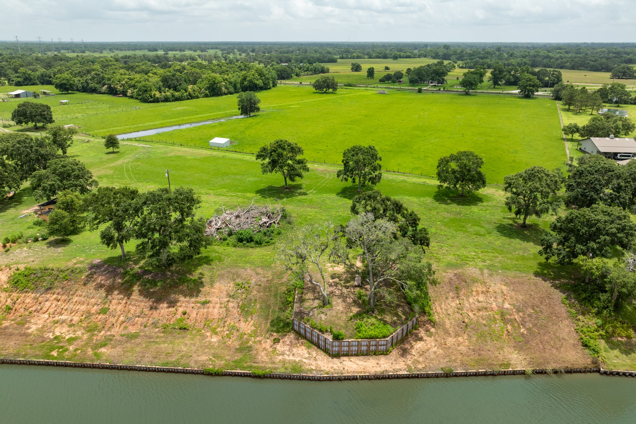 4 County Road 344 Sweeny, TX 77480 - Photo 4 of 18 a view of a lake with a mountain