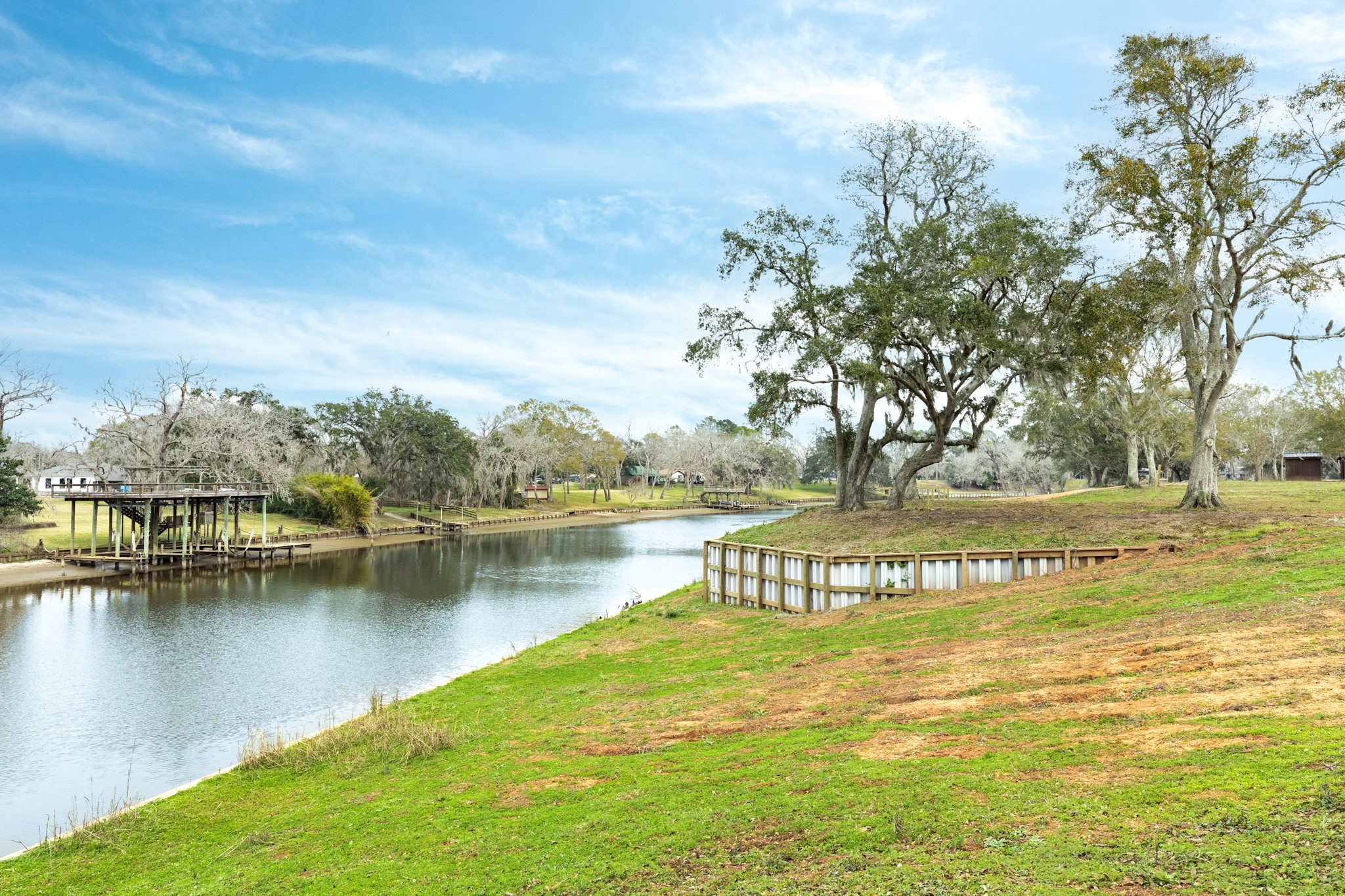 4 County Road 344 Sweeny, TX 77480 - Photo 7 of 18 a view of a lake with houses in the back