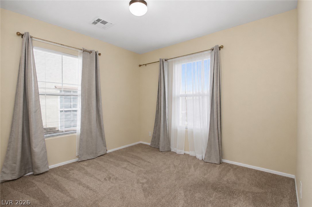 1172 Gecko Road Henderson, NV 89002 - Photo 19 of 30 2nd Bedroom has a 2 large windows and a custom closet! Virtually staged to showcase the potential of this home!
