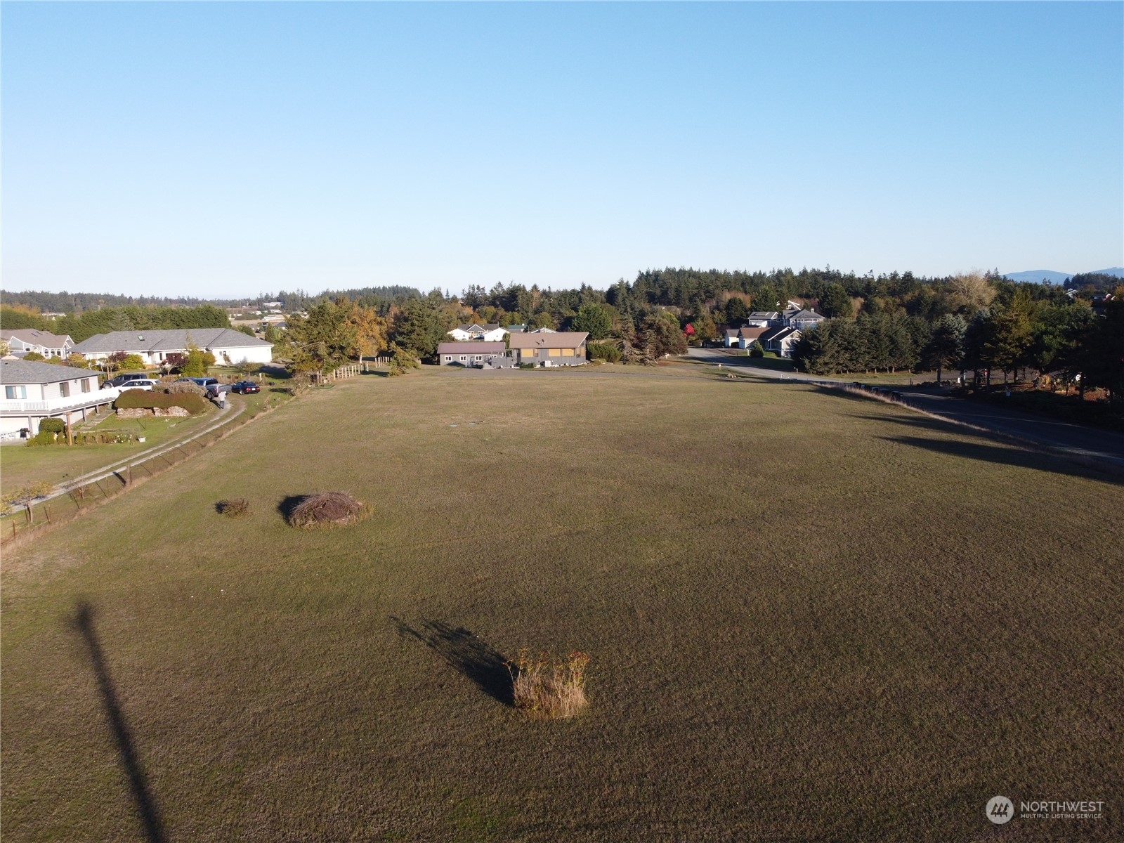 9999 Klahhane Road Sequim, WA 98382 - Photo 3 of 4 an aerial view of ocean and trees