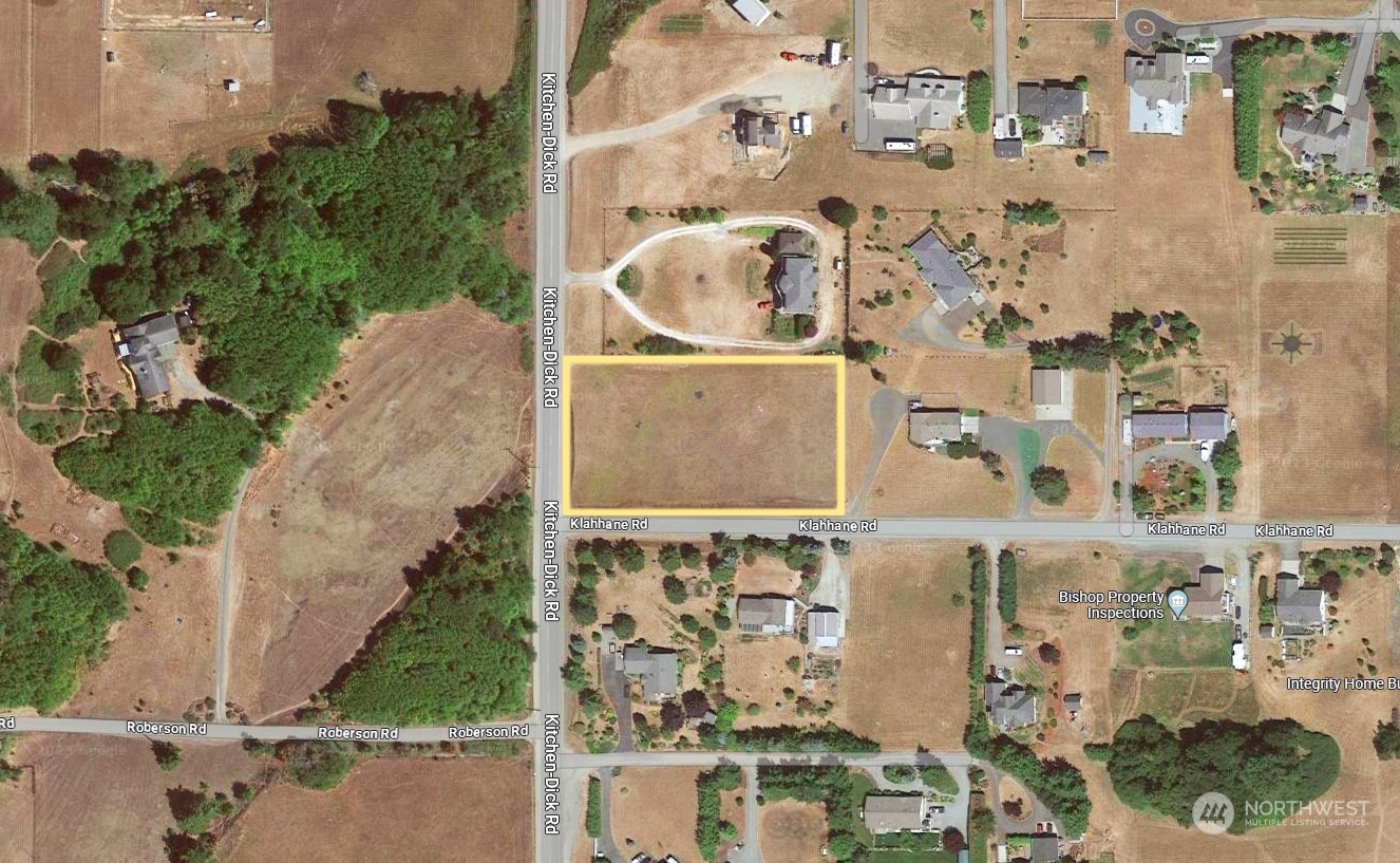 9999 Klahhane Road Sequim, WA 98382 - Photo 4 of 4 an aerial view of residential houses with outdoor space