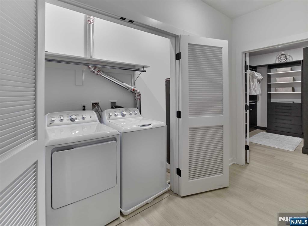 8 Tice Road, Unit 107 Franklin Lakes, NJ 07417 - Photo 16 of 29 a utility room with dryer and washer