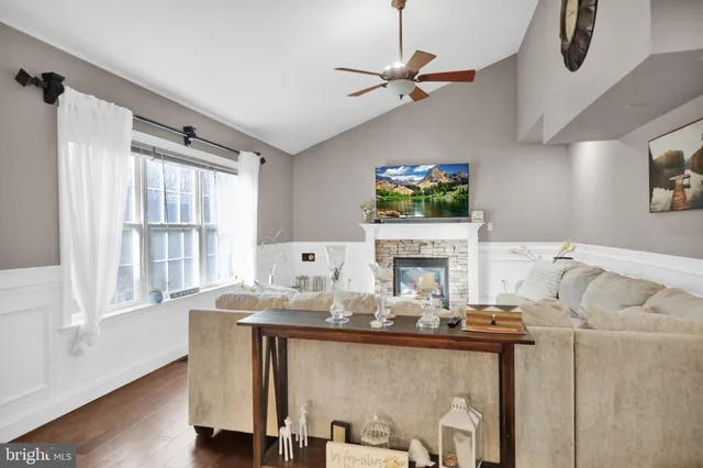 a bedroom with a bed and a night stand