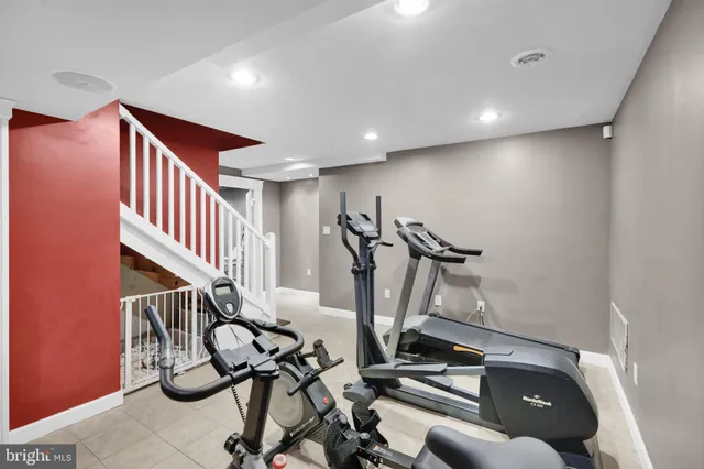 a aerial view of a house next to a yard