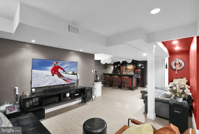an aerial view of a house with a swimming pool