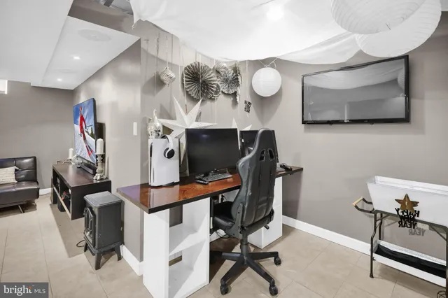 an aerial view of a house with yard swimming pool and outdoor seating